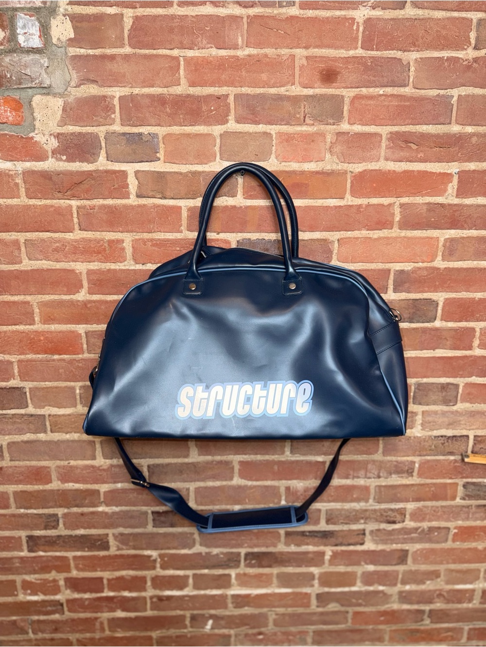 Structure Navy Duffel with White Logo and Adjustable Strap